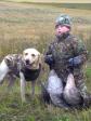 Kalle Salo is proudly presenting two Canada geese shot by his father Jouni Salo and retrieved by Ravensbank Tip (Tipi).
